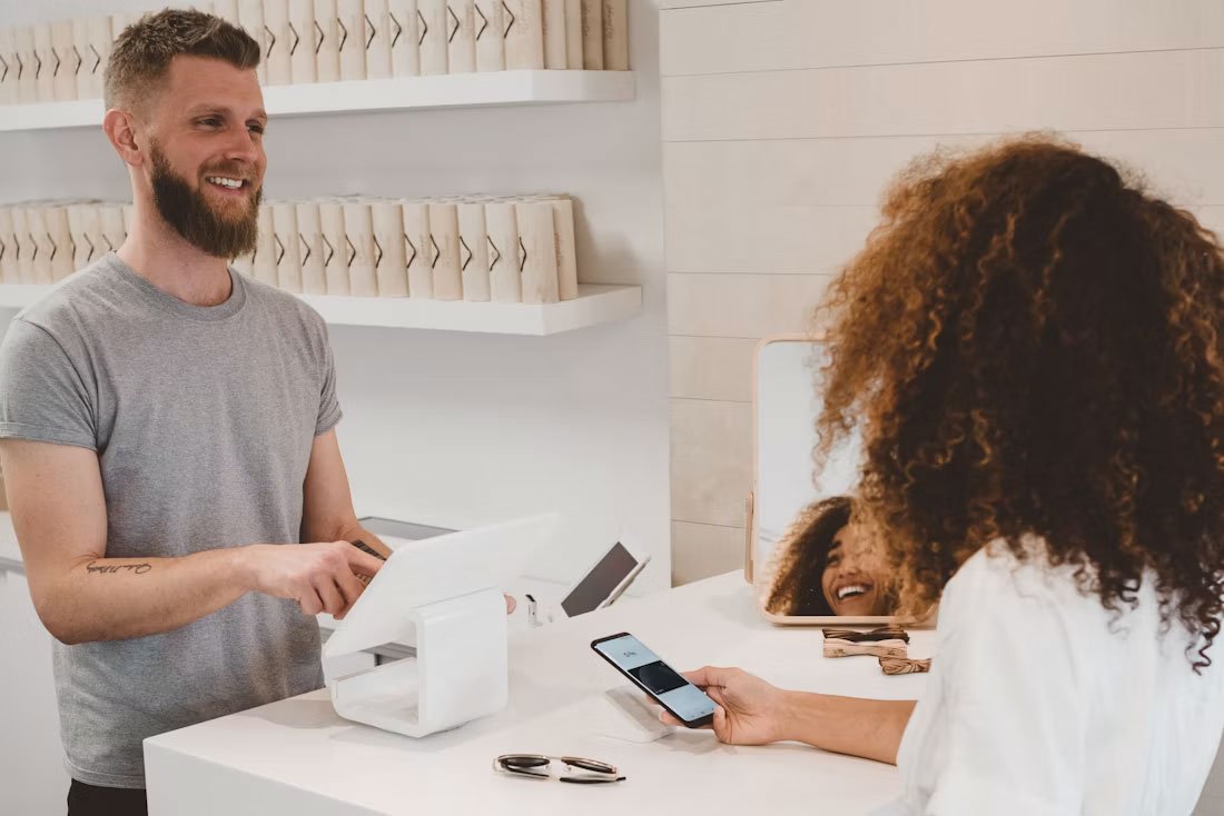 A merchant accepting a payment with BRIGE